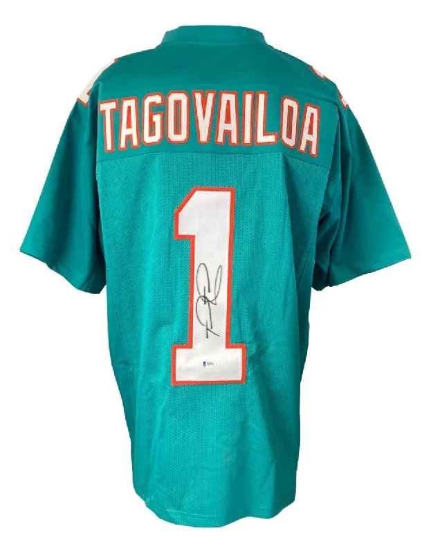 Personalized soccer jersey with team slogan-Tua Tagovailoa Miami Signed Teal Football Jersey BAS