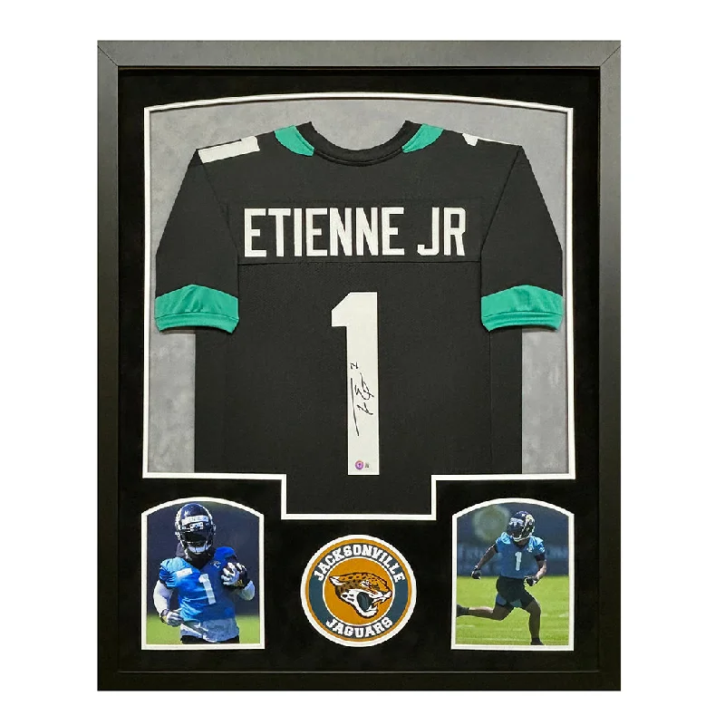 Soccer jersey with moisture-wicking technology-Travis Etienne Signed Jacksonville Black Custom Suede Matte Framed Football Jersey (Beckett)